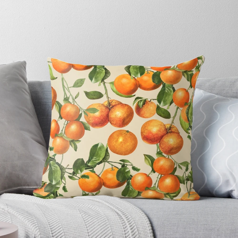 Vibrant orange fruits and delicate floral branches adorn this soothing botanical pillow, creating a calming oasis in your space.