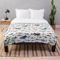 Serene watercolor shark design on a plush blanket