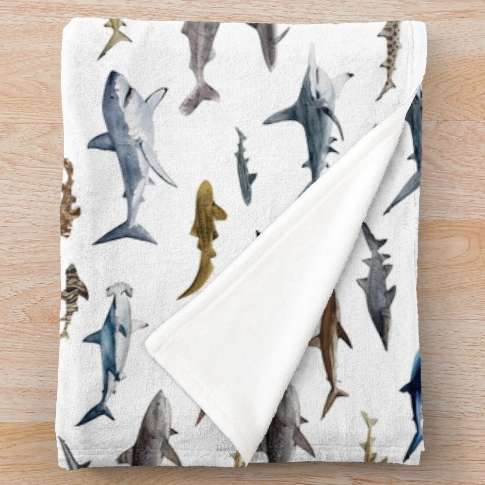 Serene watercolor shark design on a plush blanket