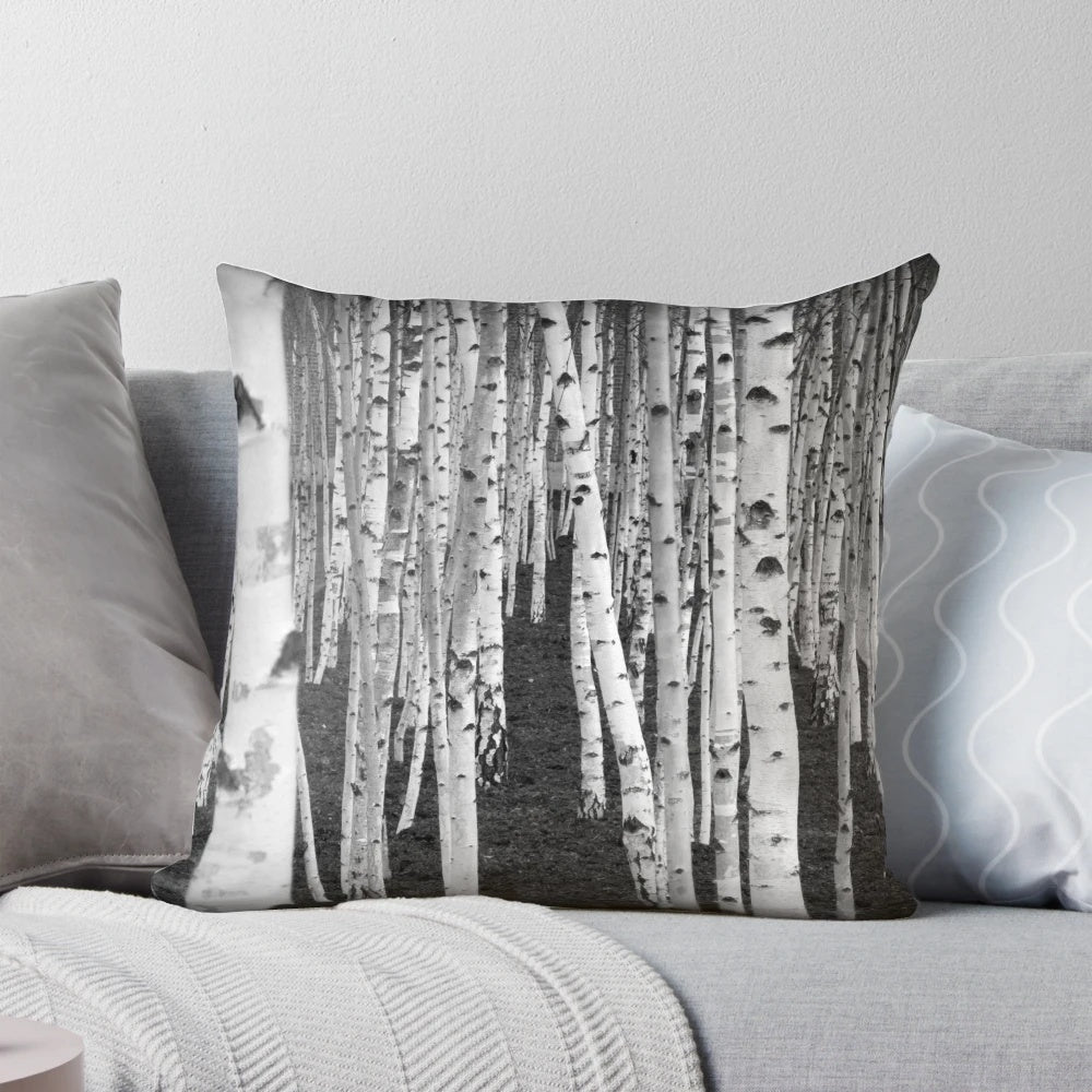Close-up of the intricate, textured bark of a silver birch tree in a nature-inspired monochrome design.