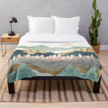 Soft, cozy plush blanket with a nature-inspired vista design