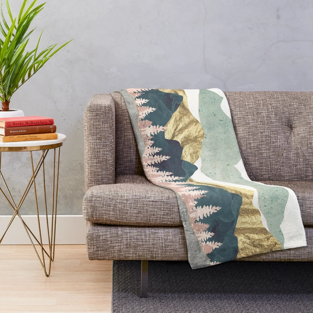 Soft, cozy plush blanket with a nature-inspired vista design