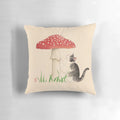 A pillow featuring a tabby cat sitting next to a colorful toadstool mushroom in a retro, Japanese-inspired art style.