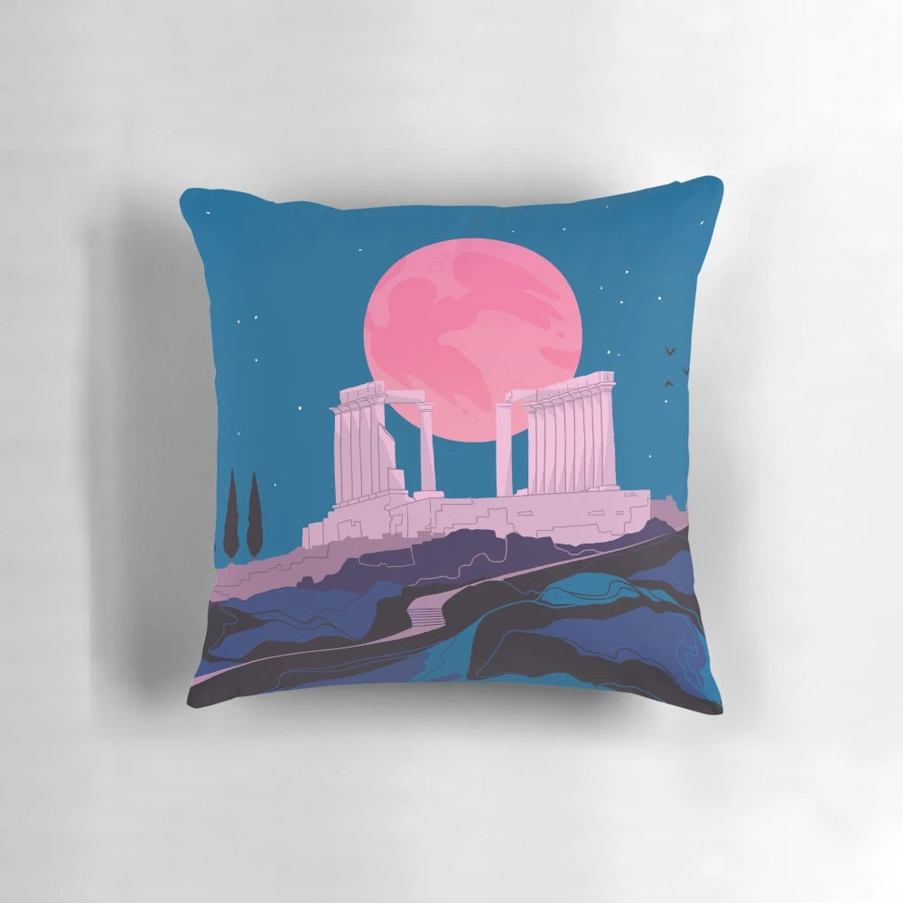 Vibrant blue pillow featuring the ancient Temple of Poseidon overlooking the sea at Sounion, Greece.