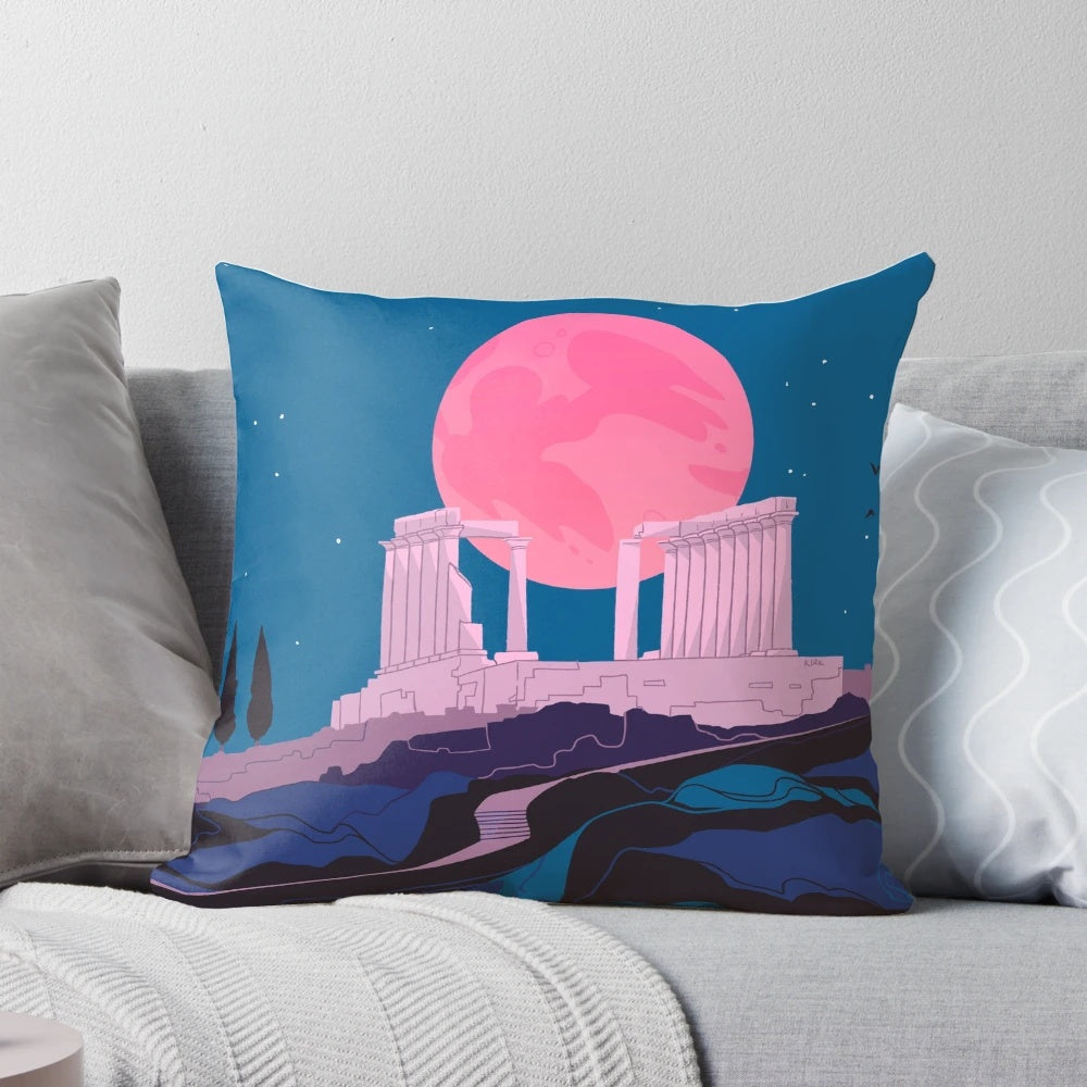 Vibrant blue pillow featuring the ancient Temple of Poseidon overlooking the sea at Sounion, Greece.