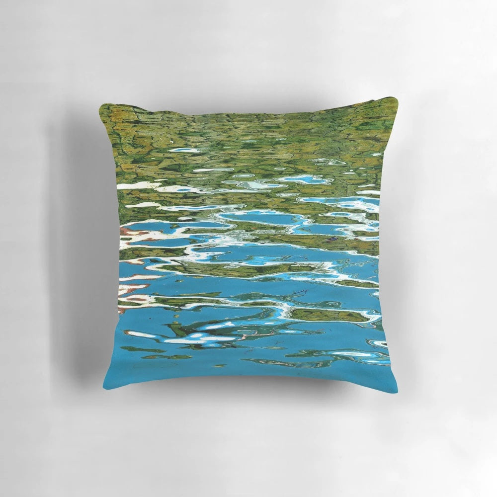 A water pillow with a shimmering, reflective surface that captures the beauty of watery patterns and waves.