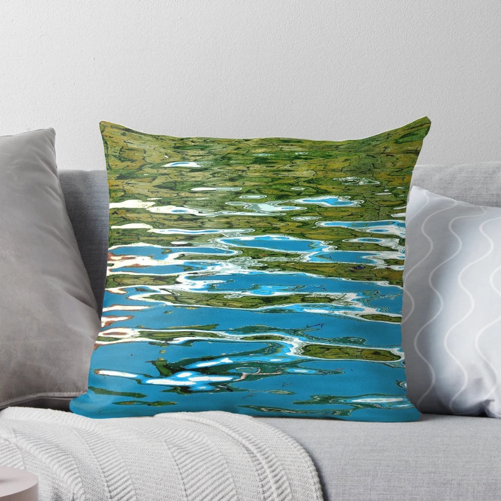A water pillow with a shimmering, reflective surface that captures the beauty of watery patterns and waves.