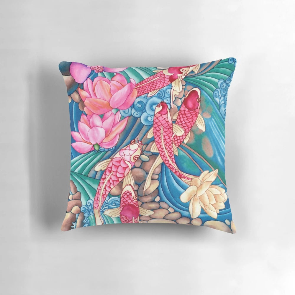 Decorative pillow featuring a hand-painted watercolor design of a tranquil koi pond with fish, flowers, and rocks