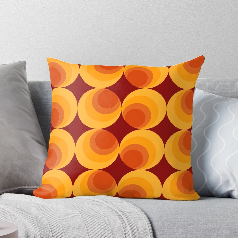 Vibrant burnt orange and white geometric pattern pillow with a retro 1970s-inspired design