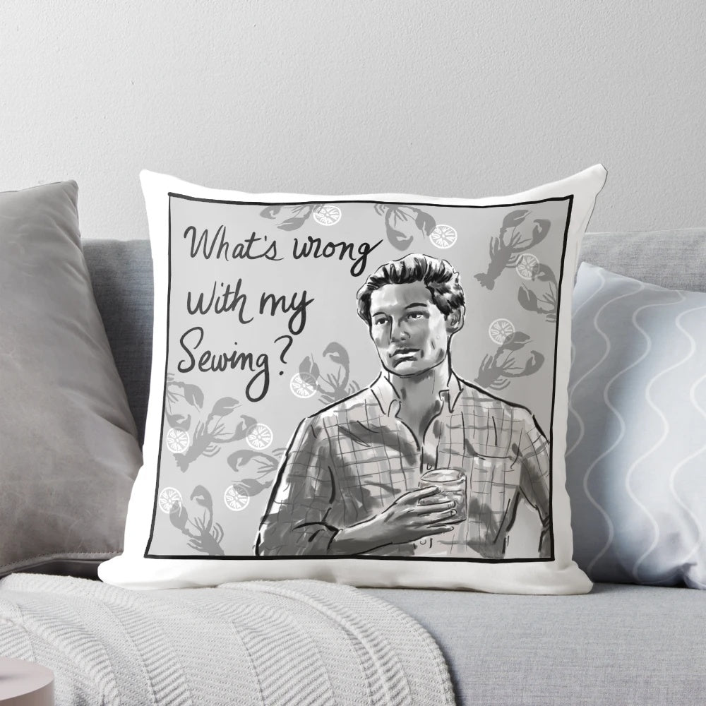 Sewing-themed decorative pillow featuring Craig Conover's "What's Wrong With My Sewing?" quote