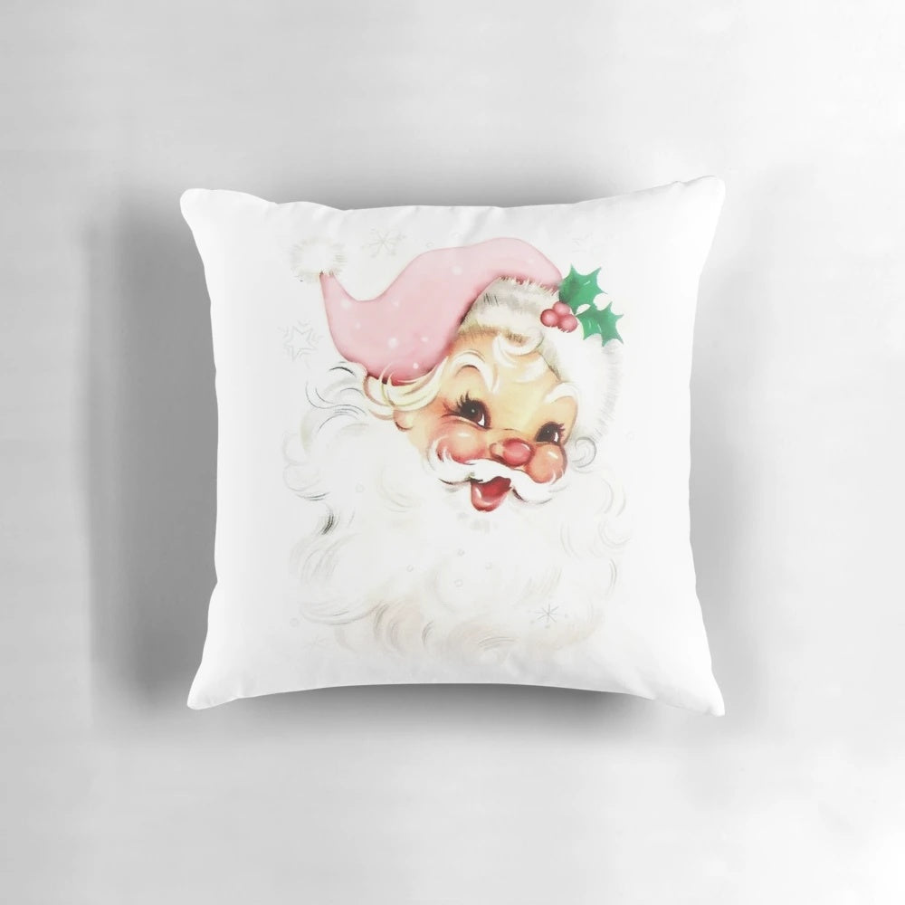 Soft, cozy pink retro-style pillow featuring a vintage santa design for holiday home accents.
