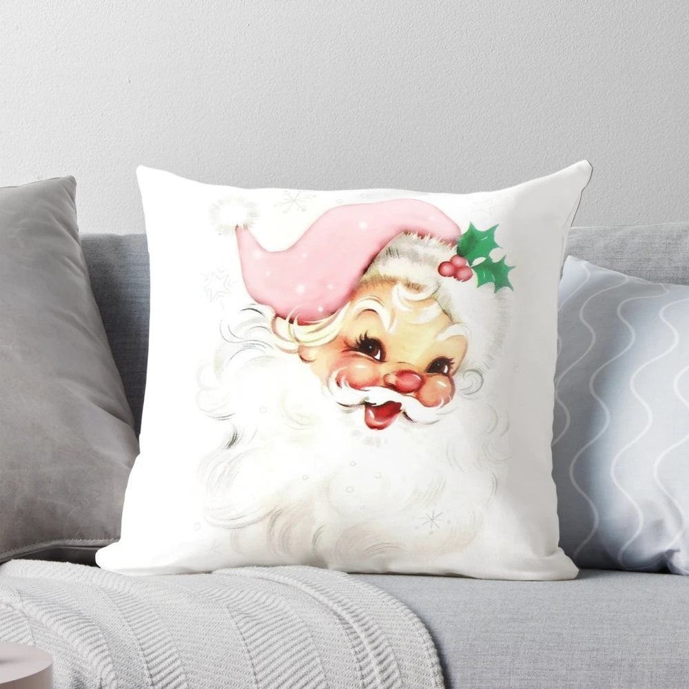 Soft, cozy pink retro-style pillow featuring a vintage santa design for holiday home accents.