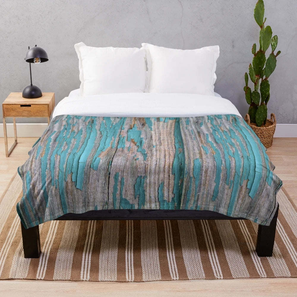 Shabby rustic weathered wood and turquoise plush blanket