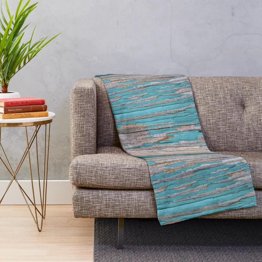 Shabby rustic weathered wood and turquoise plush blanket