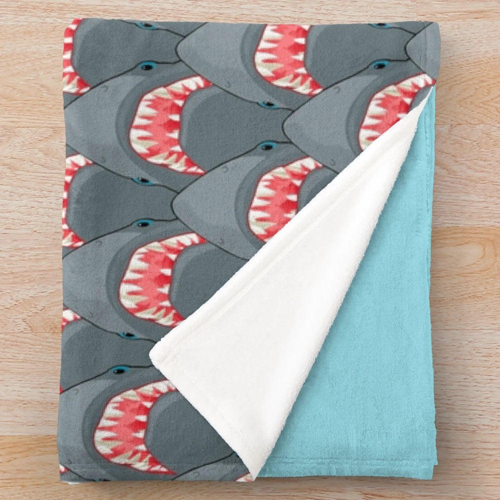 Plush blanket with Jaws movie sharks design for horror movie fans
