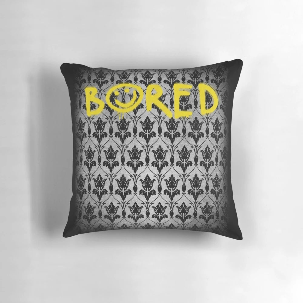 Sherlock Holmes inspired throw pillow featuring the quote "Bored" with iconic wallpaper design
