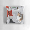 Shetland Sheepdog Sheltie wearing a Santa hat sitting on a Christmas pillow