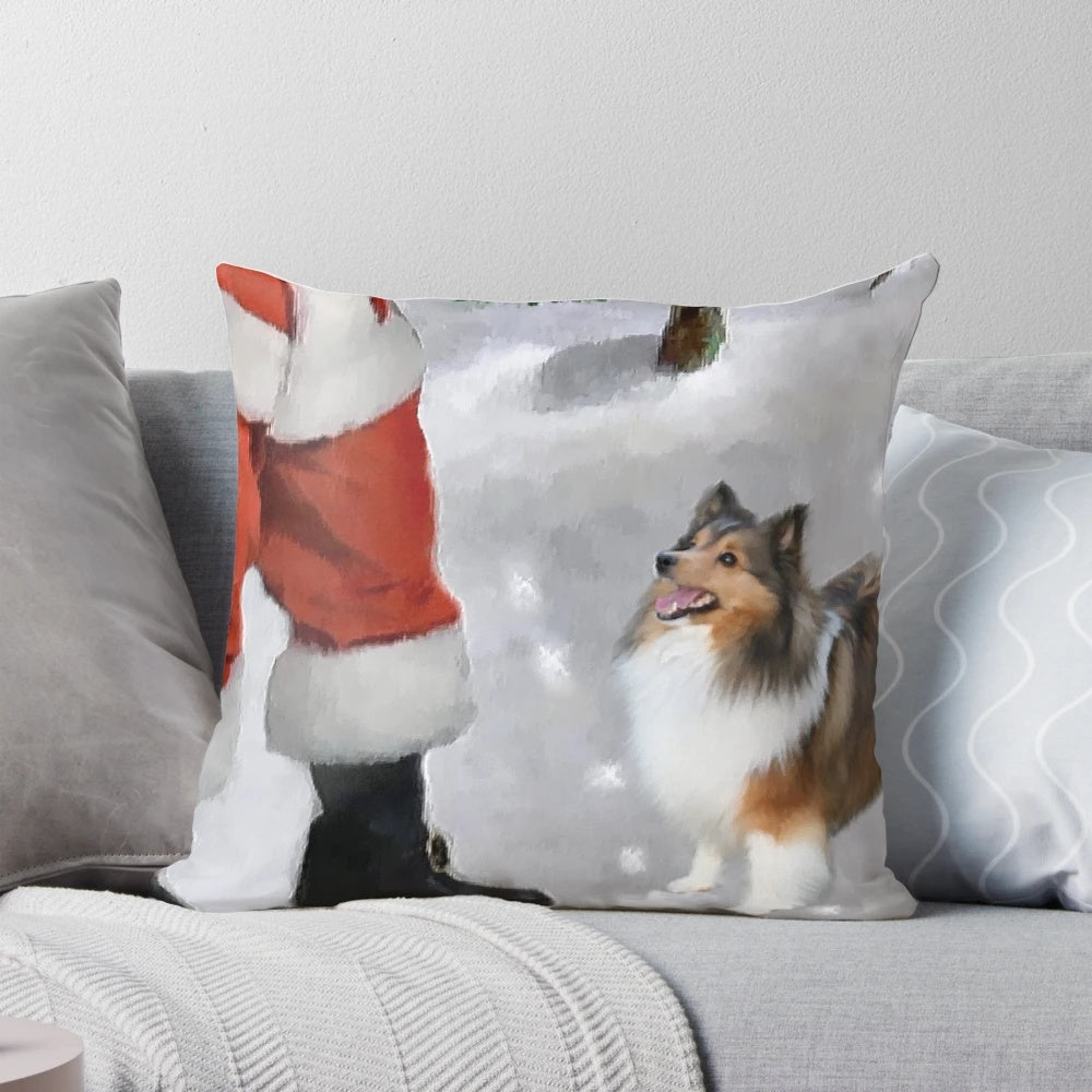 Shetland Sheepdog Sheltie wearing a Santa hat sitting on a Christmas pillow
