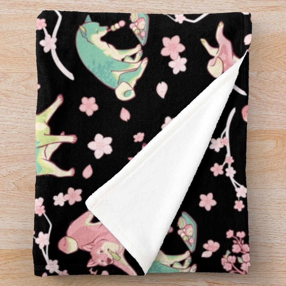 Shiba Inu inspired plush blanket with cherry blossom and matcha pattern design