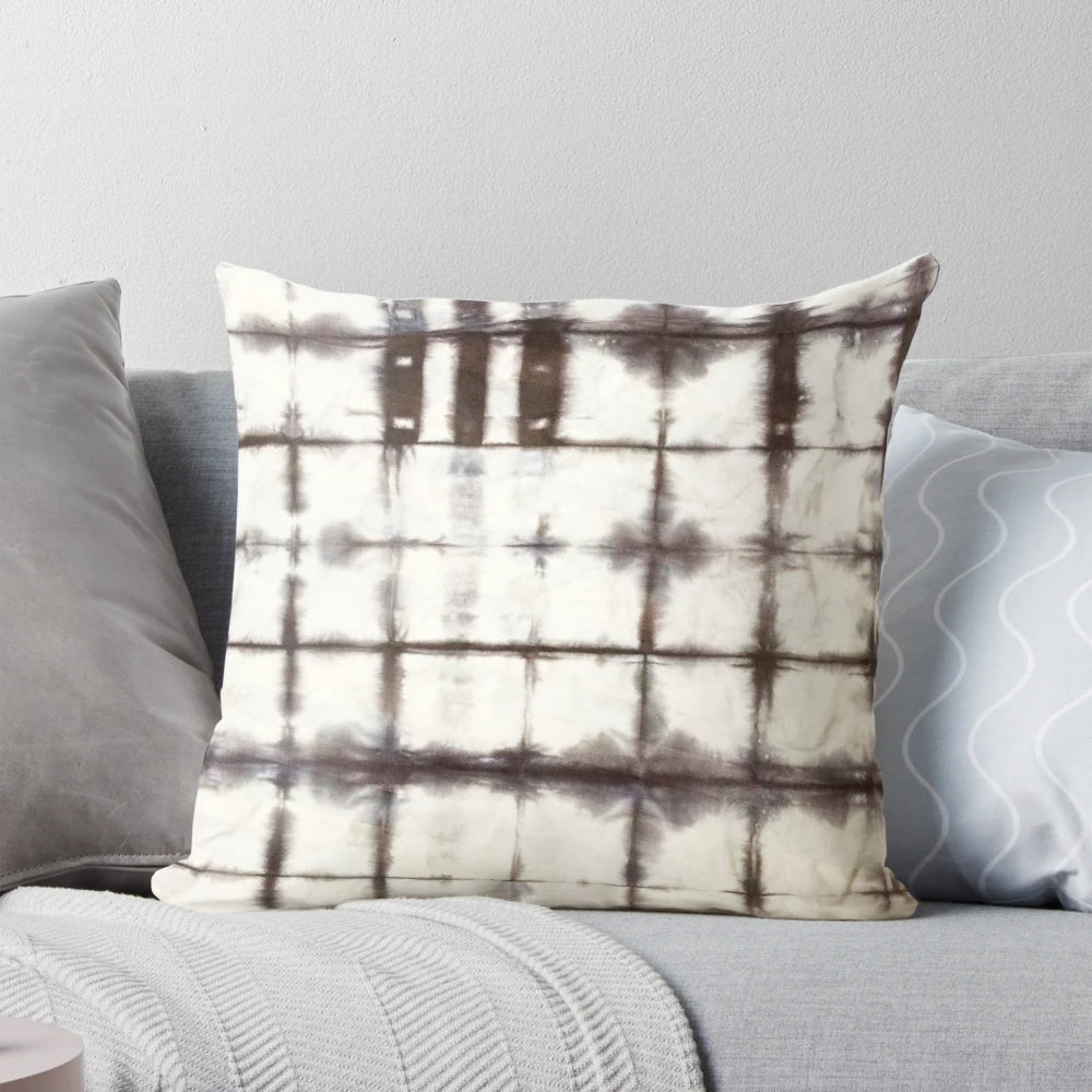 Shibori-dyed decorative pillow with a modern, trendy design