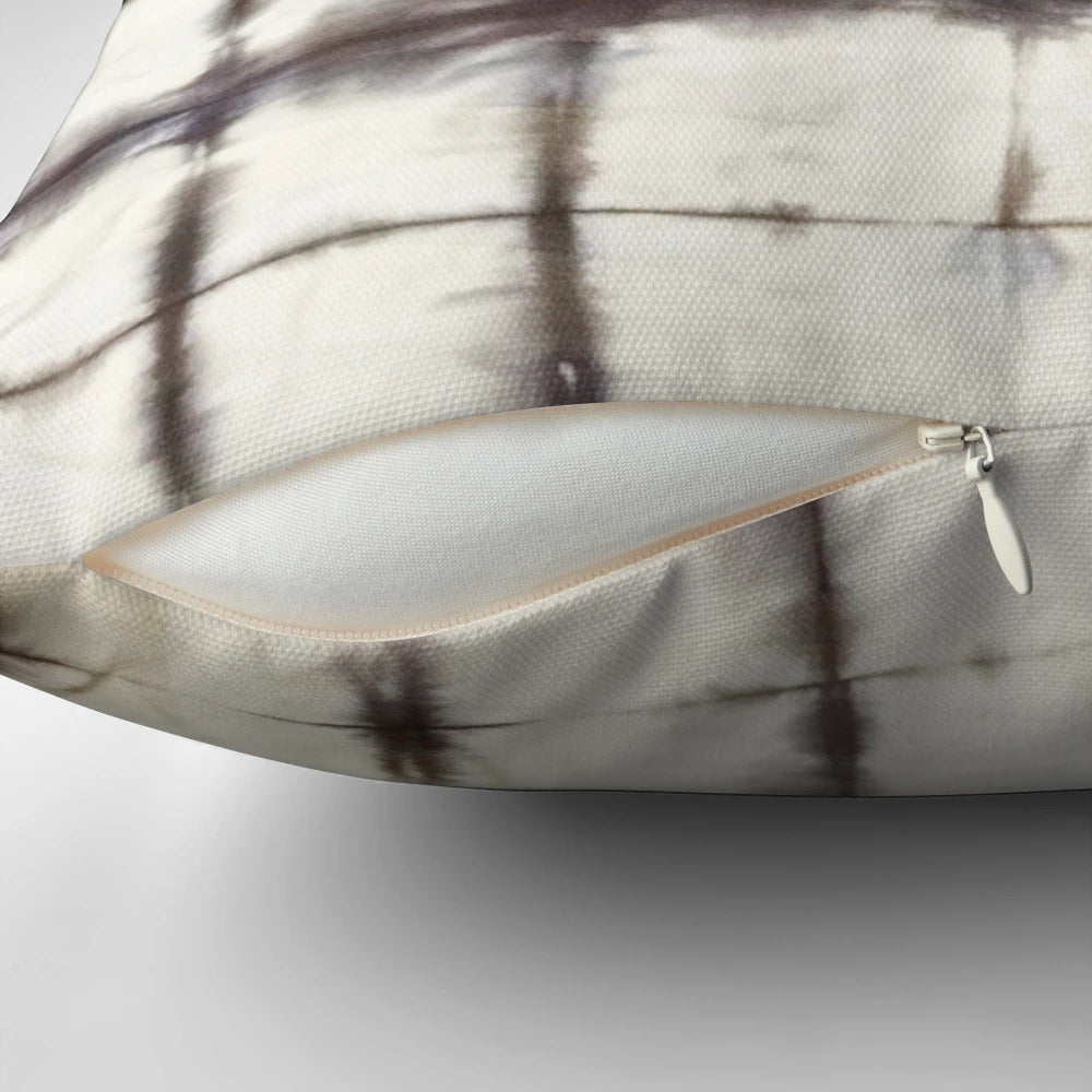 Shibori-dyed decorative pillow with a modern, trendy design