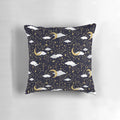 A decorative pillow featuring a celestial design of shimmering stars and moons in gold and white.