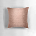 Closeup of a shiny, faux metallic copper textured pillow for home decor