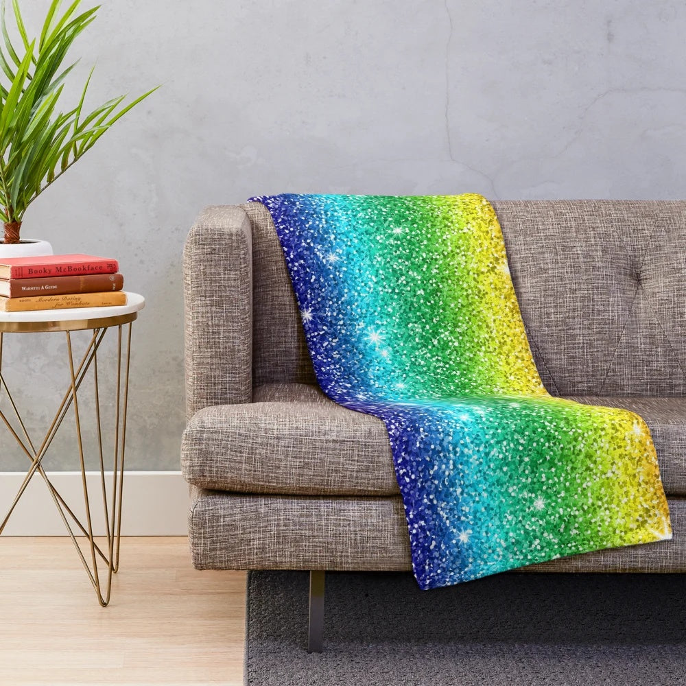 Shimmering glitter plush blanket with a radiant rainbow effect