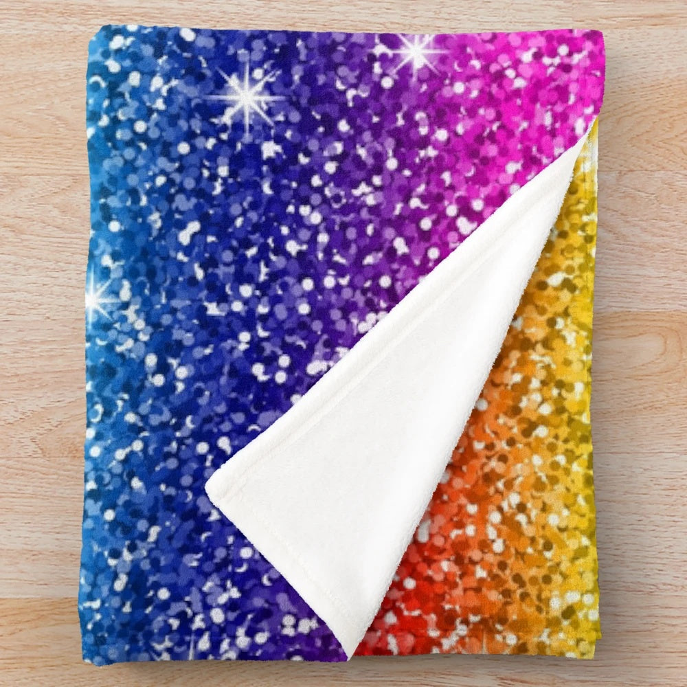 Shimmering glitter plush blanket with a radiant rainbow effect