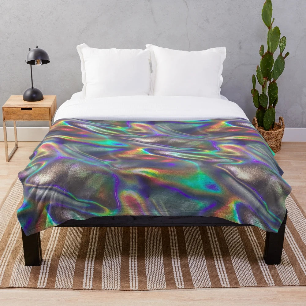 Holographic plush blanket with a mesmerizing, futuristic design