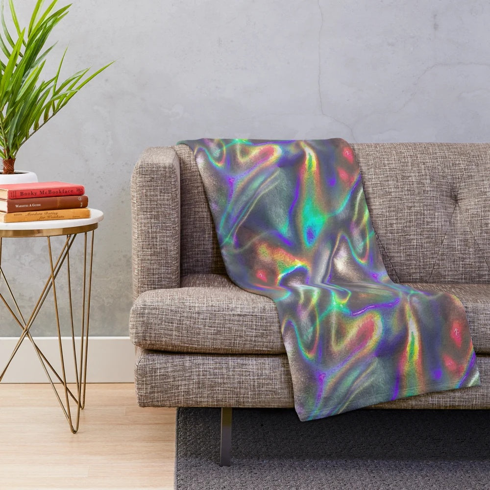 Holographic plush blanket with a mesmerizing, futuristic design