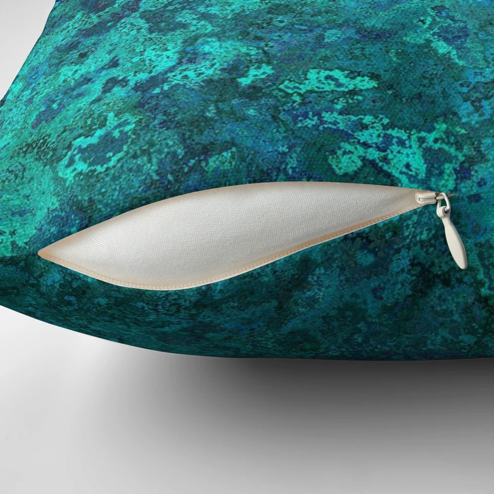 Shimmering ocean-inspired throw pillow with a textured, water-like design