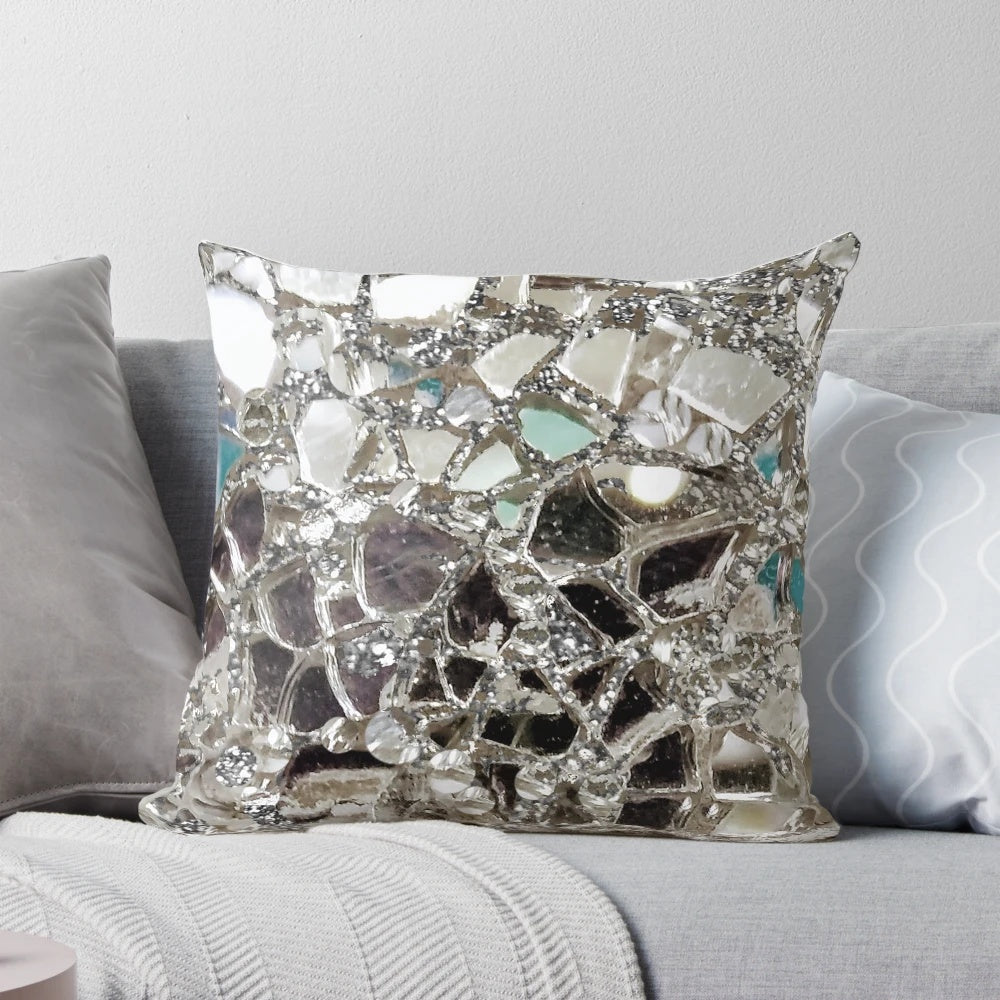 Luxurious silver glitter decorative pillow with glass and mirror accents.
