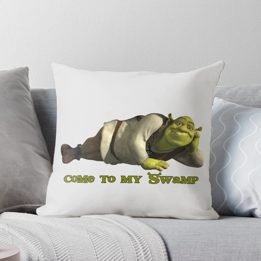 A plush, green Shrek-themed pillow featuring the iconic ogre character from the Dreamworks film franchise.