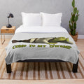 Shrek-themed plush blanket with green ogre design