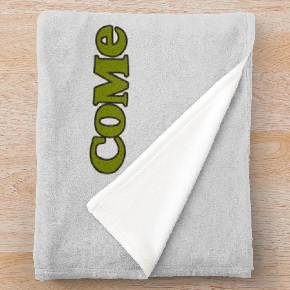 Shrek-themed plush blanket with green ogre design