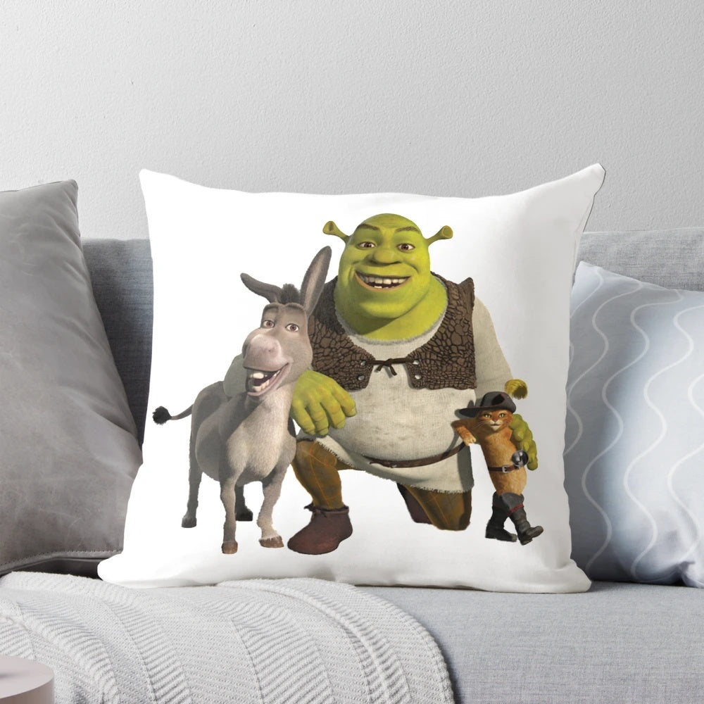Plush pillow featuring characters from the Shrek movie franchise, including Shrek, Puss in Boots, and Donkey