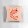 A red and pink cartoon shrimp pillow with the text "Shrimply the Best