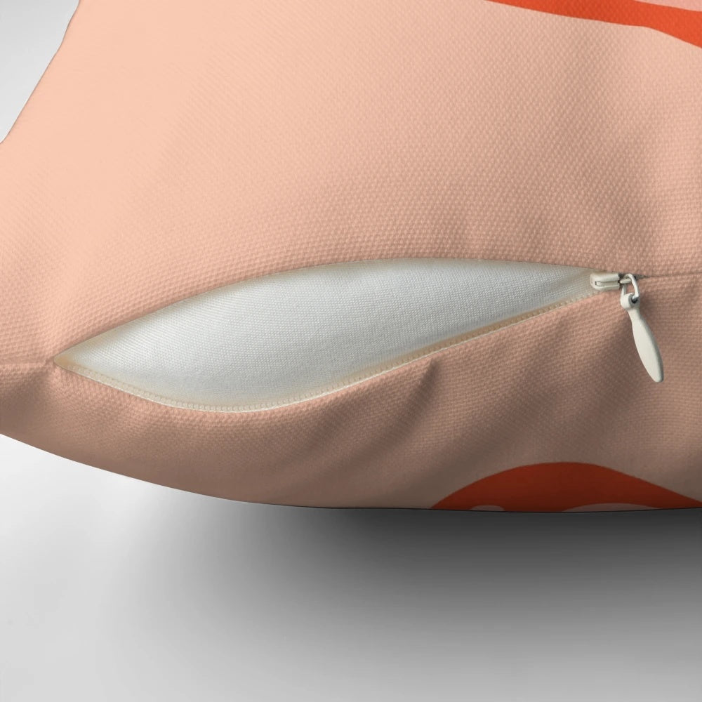 A red and pink cartoon shrimp pillow with the text "Shrimply the Best