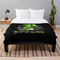 Plush blanket featuring a shrunken head design inspired by the work of Pushead and Zorlac skateboards