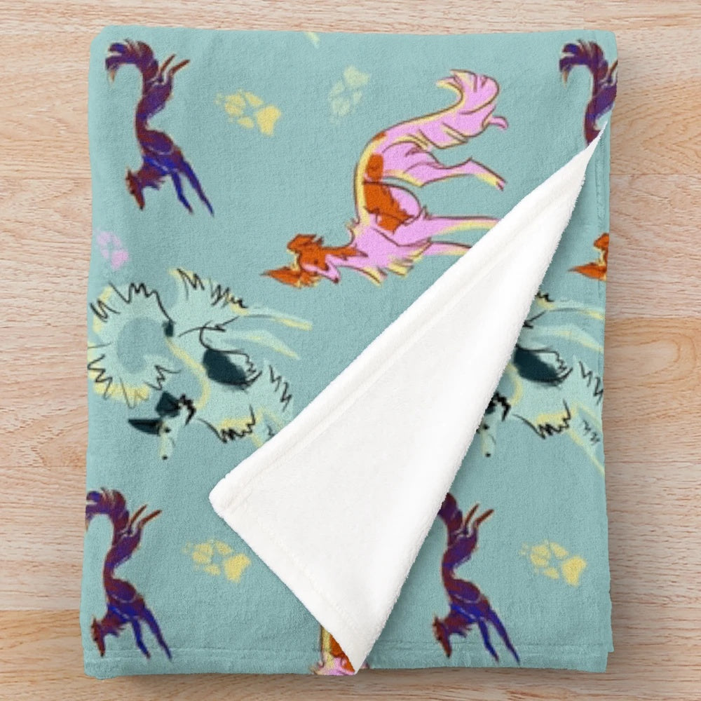 Plush blue blanket with silky, decorative windhound pattern
