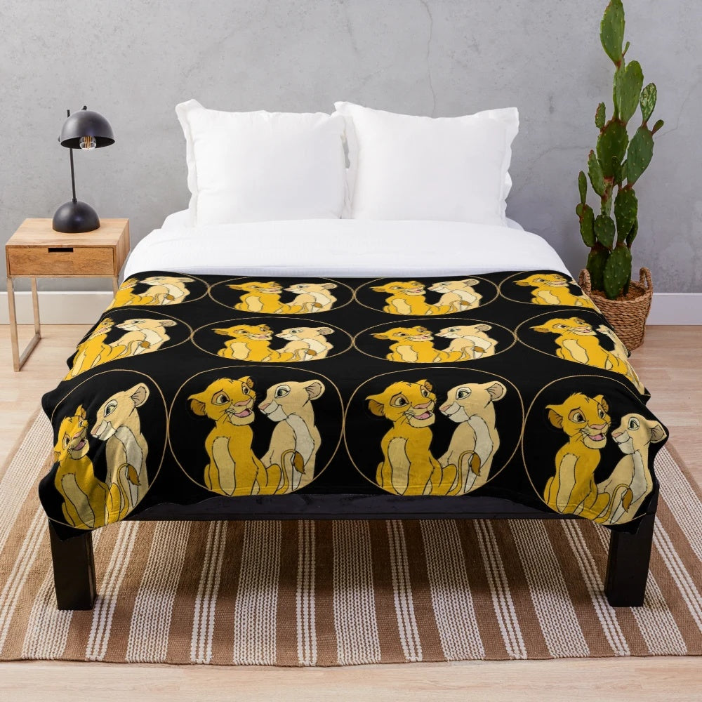Soft, cuddly plush blanket featuring Simba and Nala from The Lion King