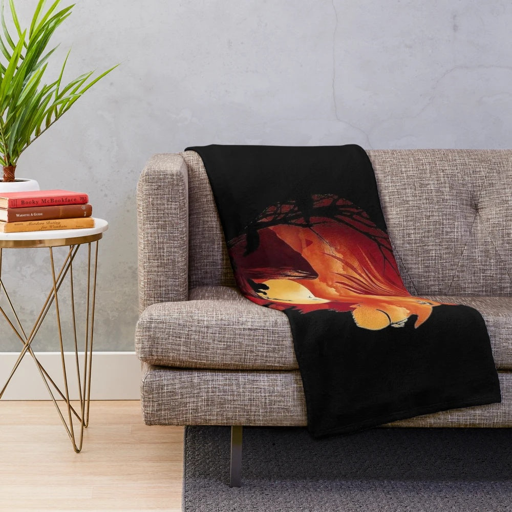 Closeup of a plush blanket featuring the face of Simba from The Lion King