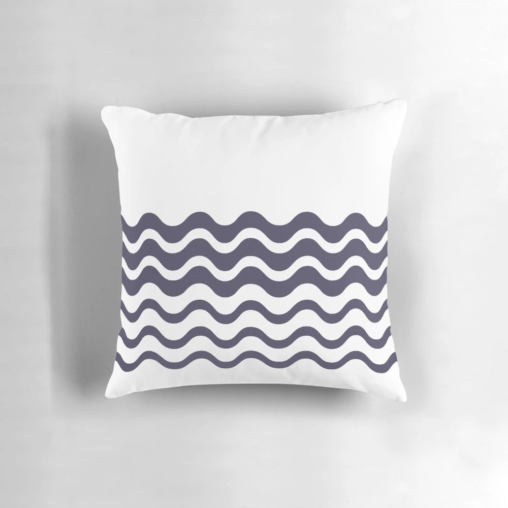 Simple white background with dark blue wave pattern pillow