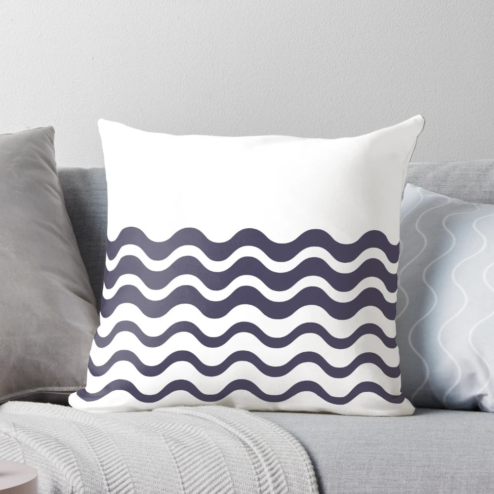 Simple white background with dark blue wave pattern pillow