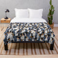 Singing Penguins Plush Blanket featuring a beautiful illustration of penguins in Antarctica