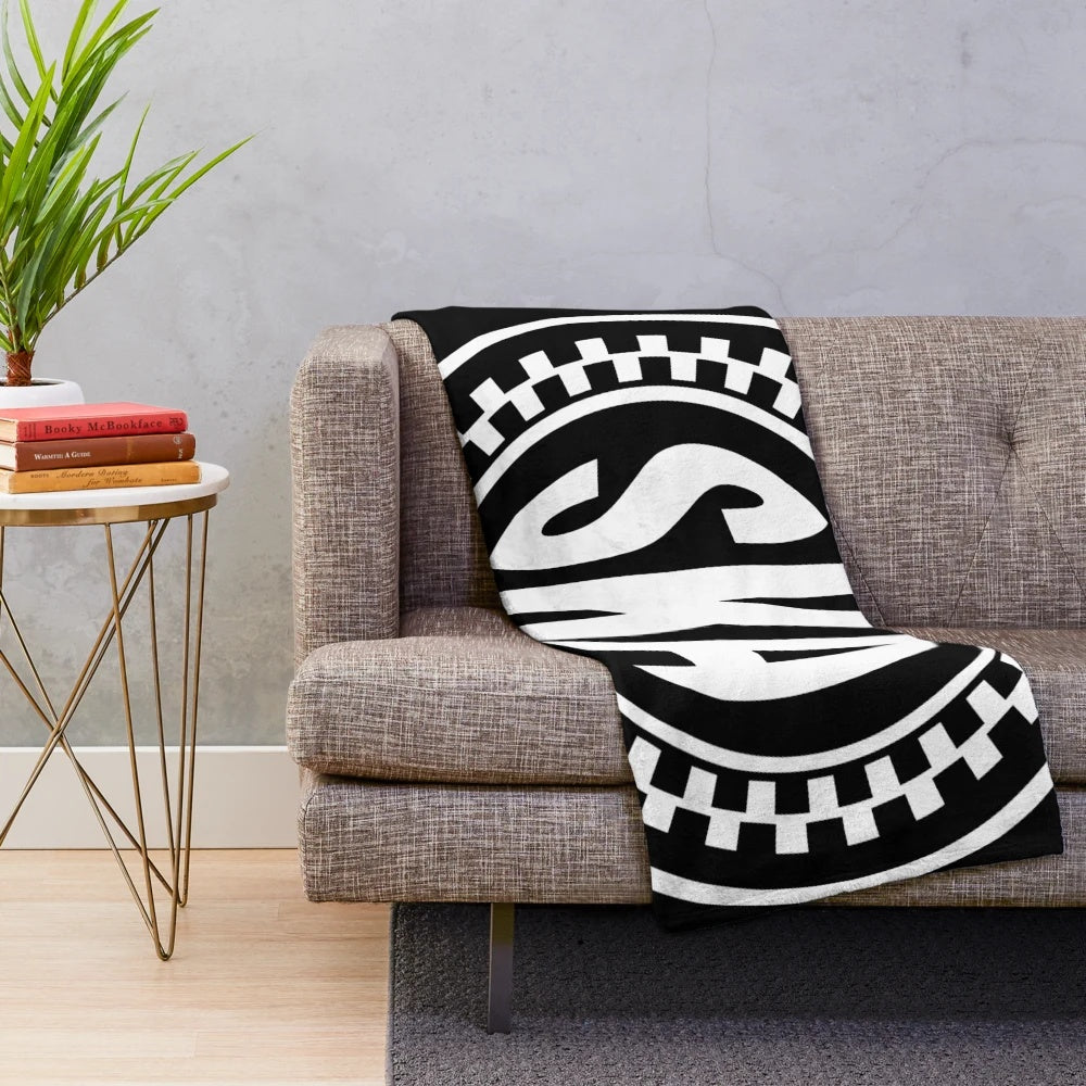 Plush blanket featuring the iconic ska music symbol or logo