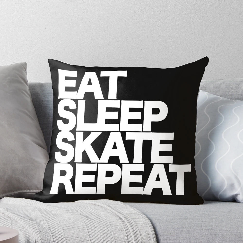 Skateboarding-themed pillow with the text "Eat Sleep Skate Repeat"