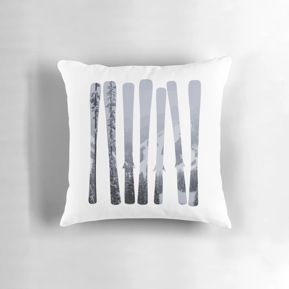 Ski designs and winter art featuring a mountain landscape on a DopeyArt pillow