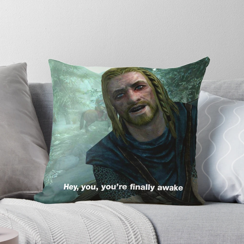 A cozy pillow featuring the iconic "You're Finally Awake" meme from the video game Skyrim.